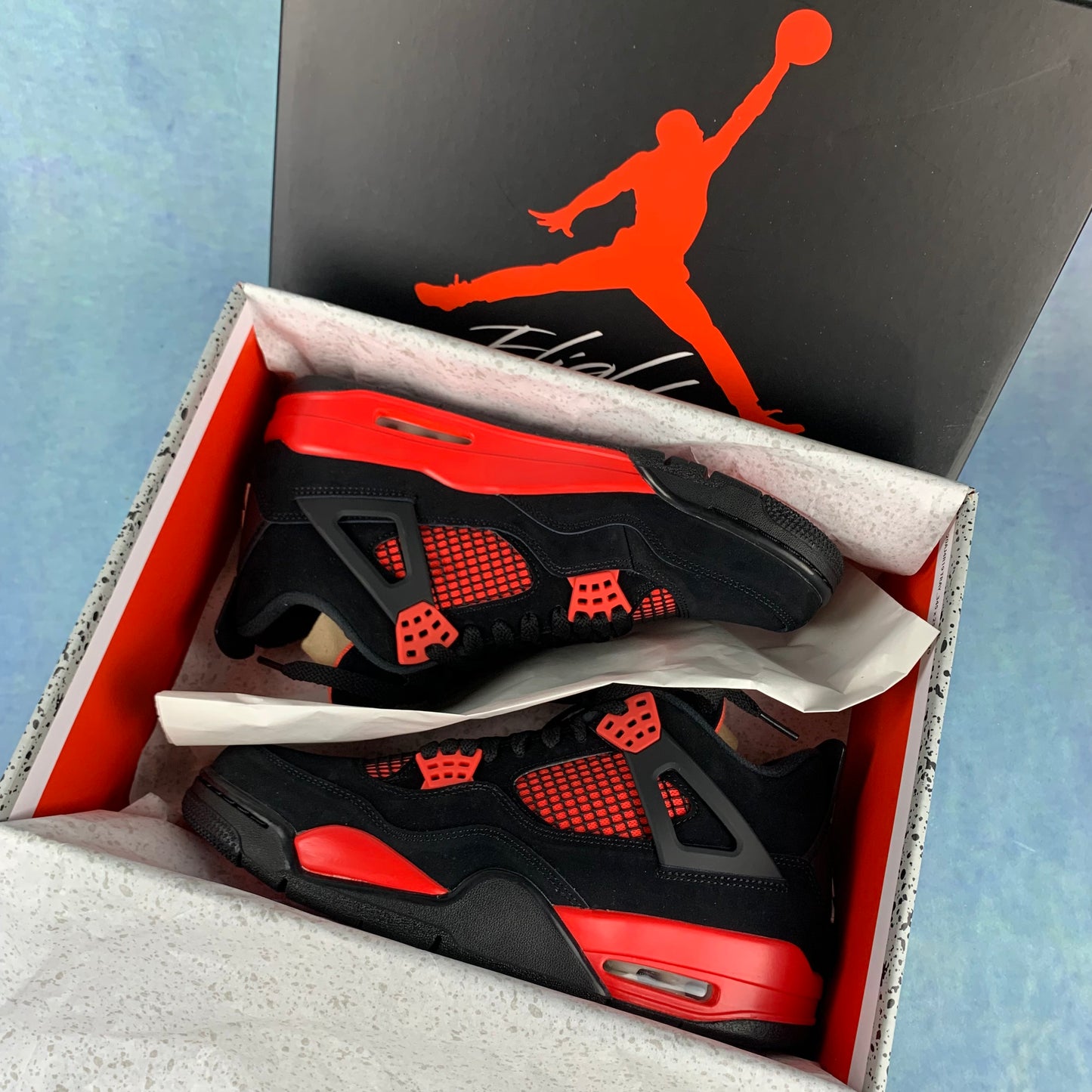 Jordan 4 "Red Thunder"