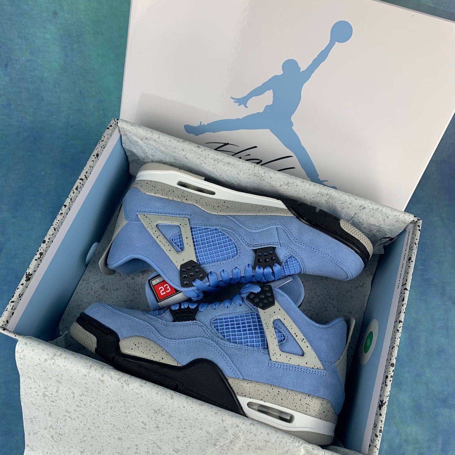 Jordan 4 "University Blue"